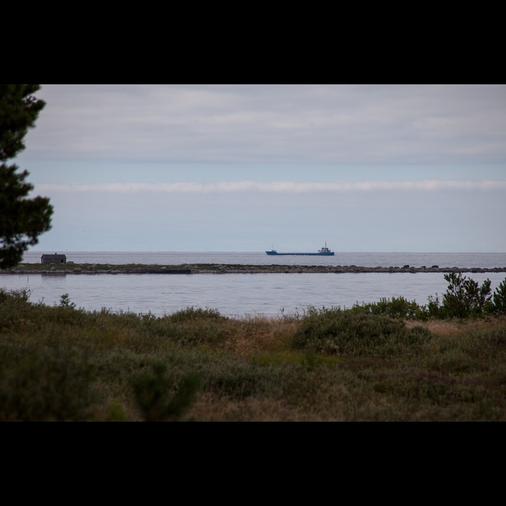 There is a constant stream of ships from the west coast rounding Lista on their way into Skagerak - The voew from our cabin, acress Rauna.