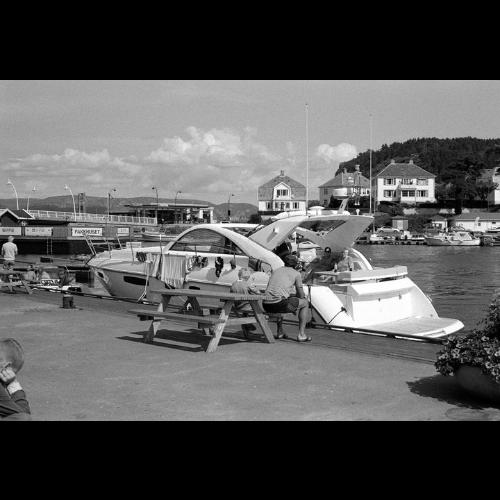 These Norwegians used to be quite happy with a boat like the one in the background.