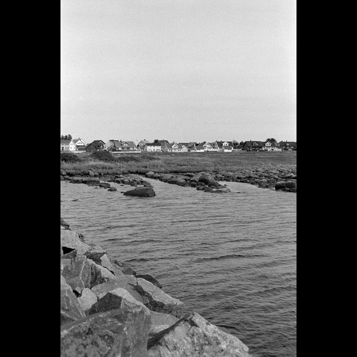 Tjørvehavn - the rows of stones are centuries old protection for small boats belonging to fishing farmers. (B&W film)
