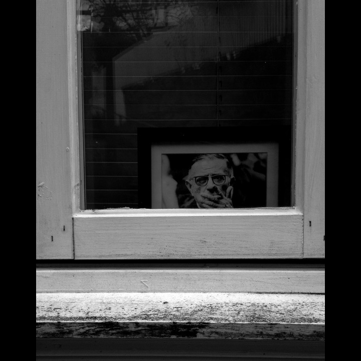 Jean-Paul Sartre peering out of a window in Øvre Strandgate