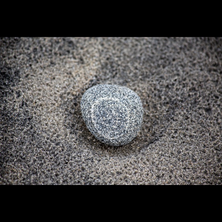 A pebble in the sand after the gales