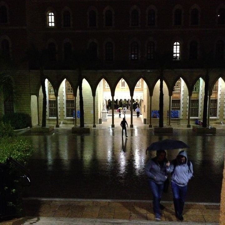 AUB's College Hall on a rainy evening
