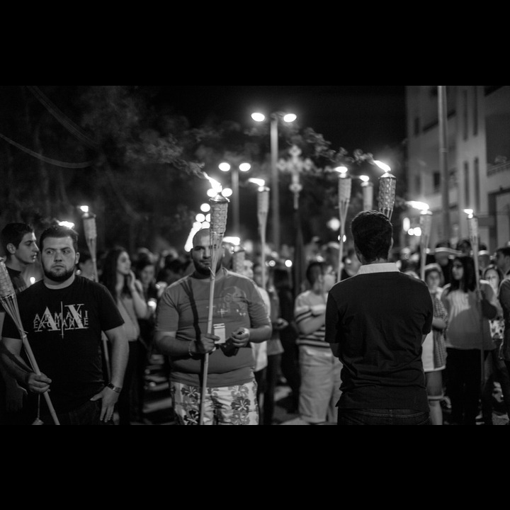 The procession taking the Holy Flame from the Boulevarde to the Greek Orthodox Church in Marjaayoun