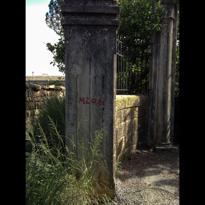 The number on the gatepost of the house