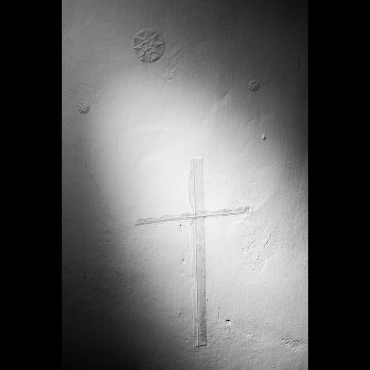 There are three over-painted stars and a cross by my bed