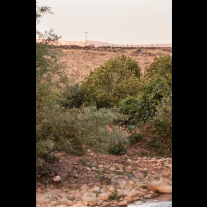 Israeli border patrol at the fence on the top of the ridge