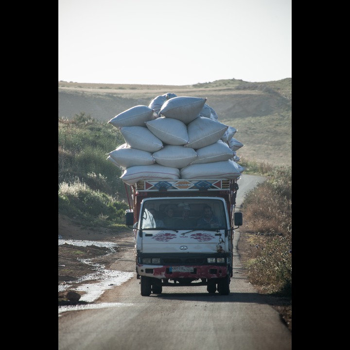 Overloaded truck near the Wazzani River