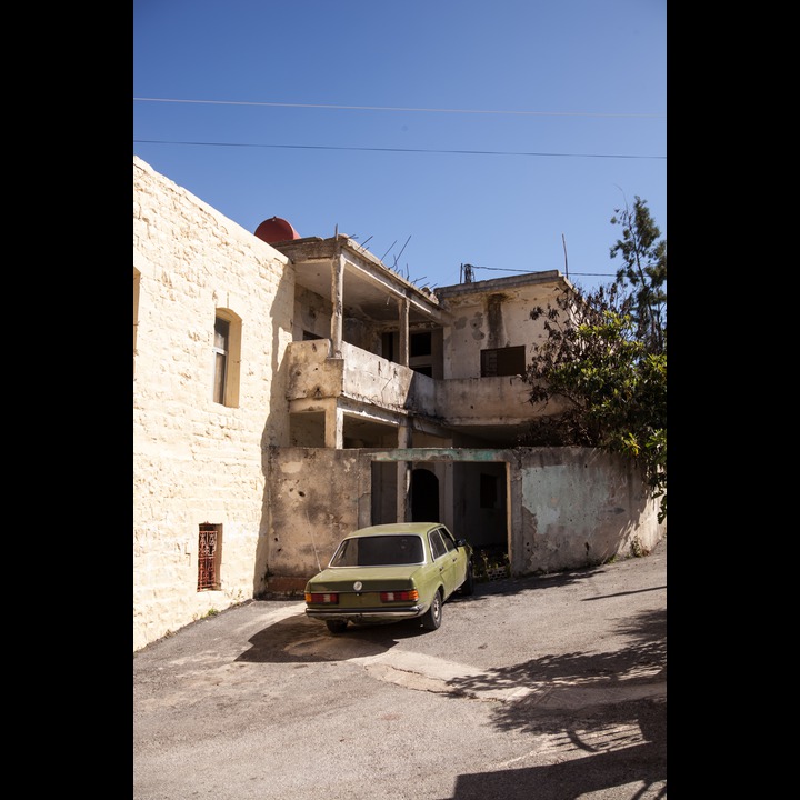 War-damaged (2006) building facing the SHrine of Khodr in Yaroun