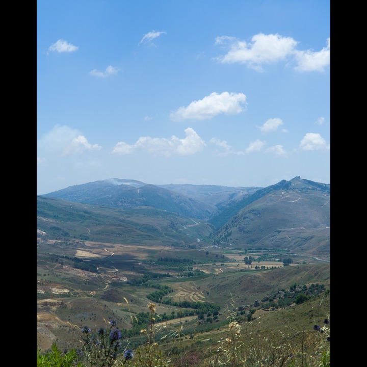 The Litani Valley - a fire above Deir Mimas and Beaufort Castle to the right