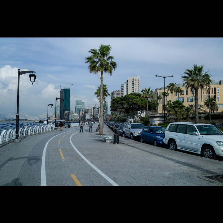 The turn in the Corniche by the AUB beach, with the middle marker for runway 17 at the airport between the four lanes, the AUB building that replaced the Durafour building, and the towers sprouting up all along the waterfront.