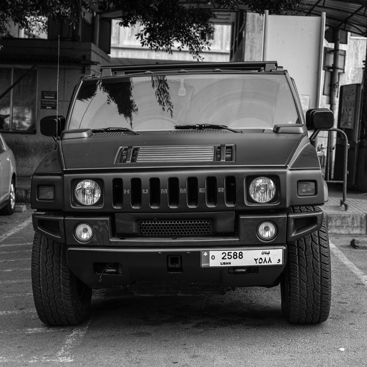 See in an AUB hospital car park, Hummer, mat anthracite gray, black windows, and expensive license plates - a rolling fortune