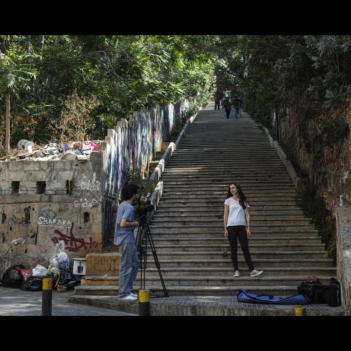 The AUB stairs from Rue Van Dycke to Rue Kennedy. The owner of the new tower block on this corner did not want Sukleen's garbage containers across the street, but the residents persist in habits aquired during the civil war.