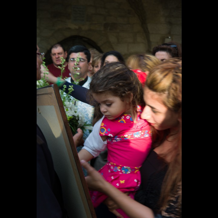 Receiving the blessing of the Holy Virgin and touching the relig of Pope John Paul (a drop of blood)