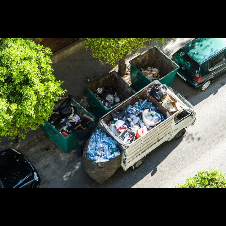 Green entrepreneurship in Beirut. These guys make a living sorting plastics out of the garbage before Sukleen emptys the containers.