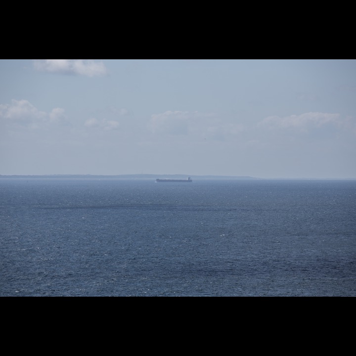 Ship heading south into Øresund - from Kullens Lighthouse, Kullaberg